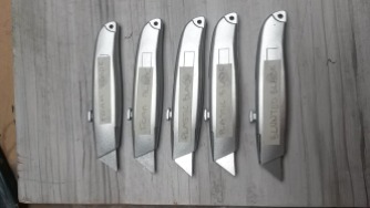 Craft Knives with a variety of safer blades, one is blunted and others are made out of plasticard and soft craft foam